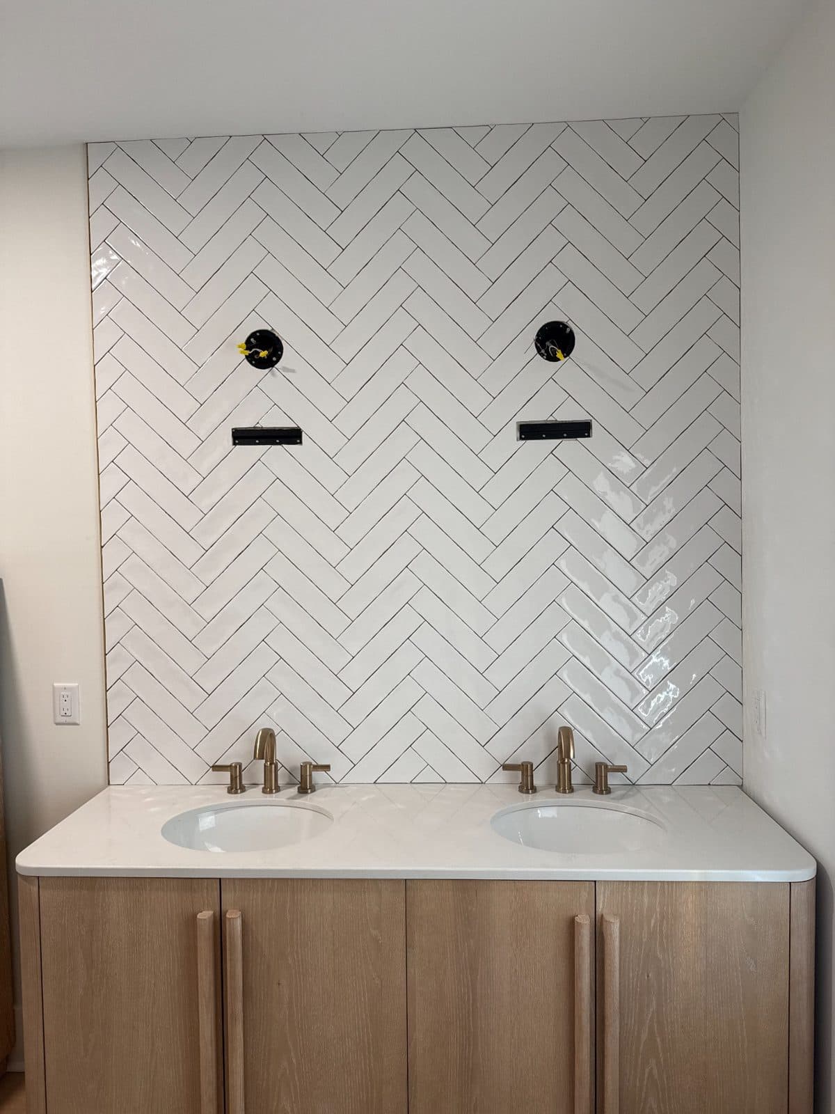 Double Vanity · Herringbone Backsplash